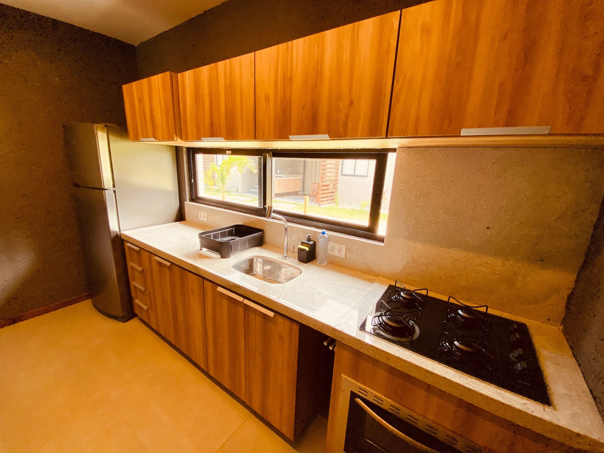 Kitchen or kitchenette — Villas Manatee Milagres D 001 by QAVI