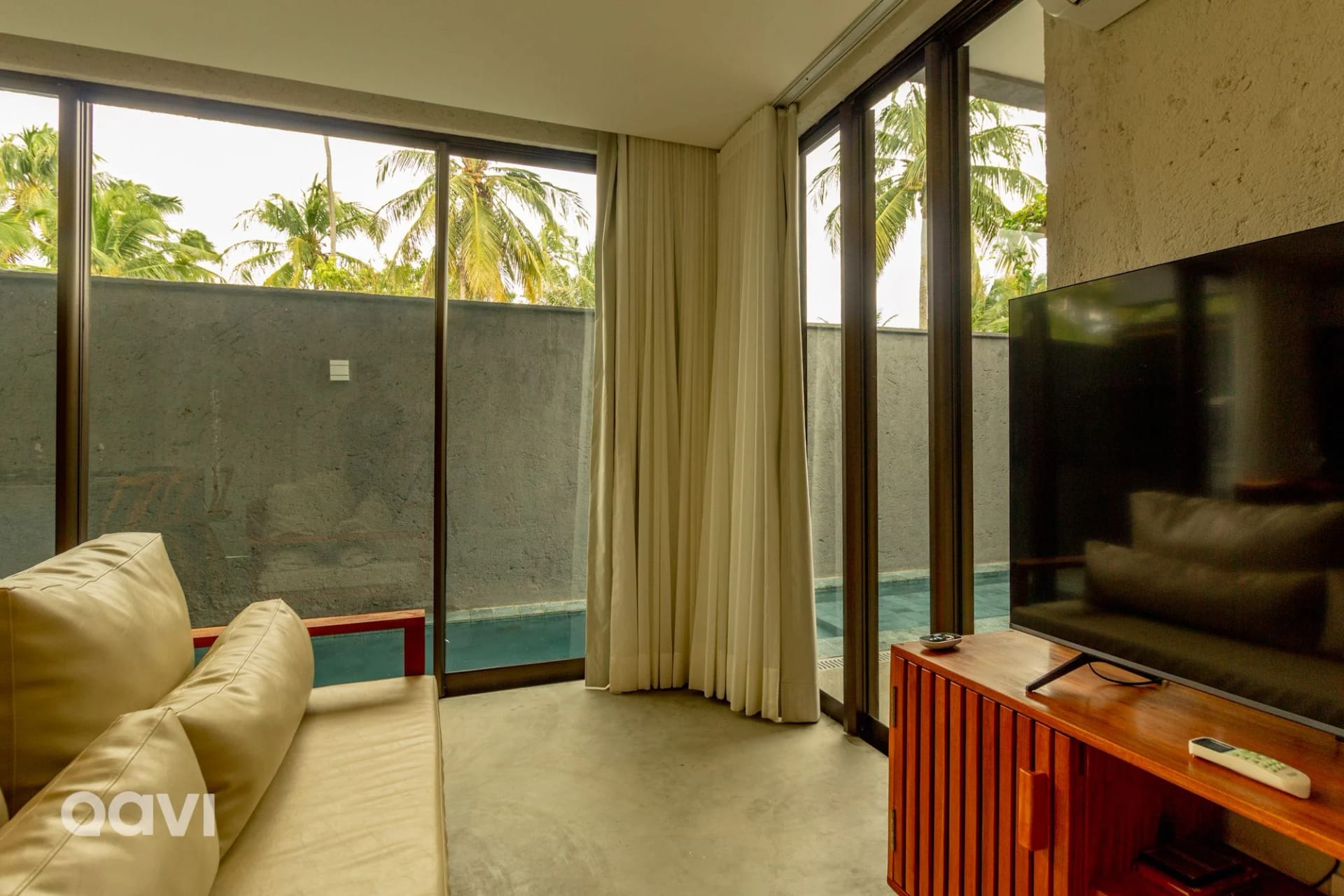 Lounge compartilhado / Sala de TV — Apartamento em condomínio Tamoná 06 by Qavi
