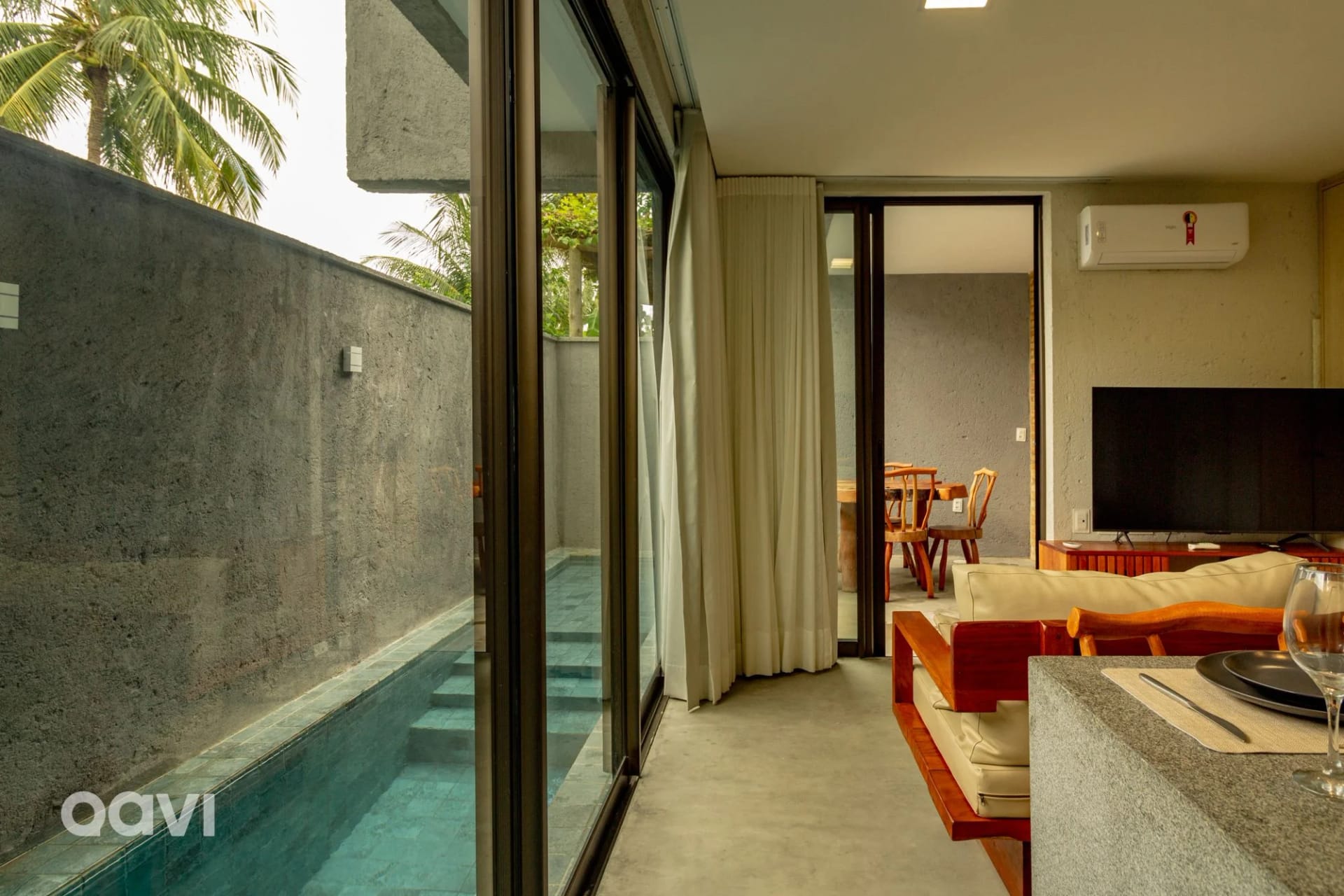 Lounge compartilhado / Sala de TV — Apartamento em condomínio Tamoná 06 by Qavi