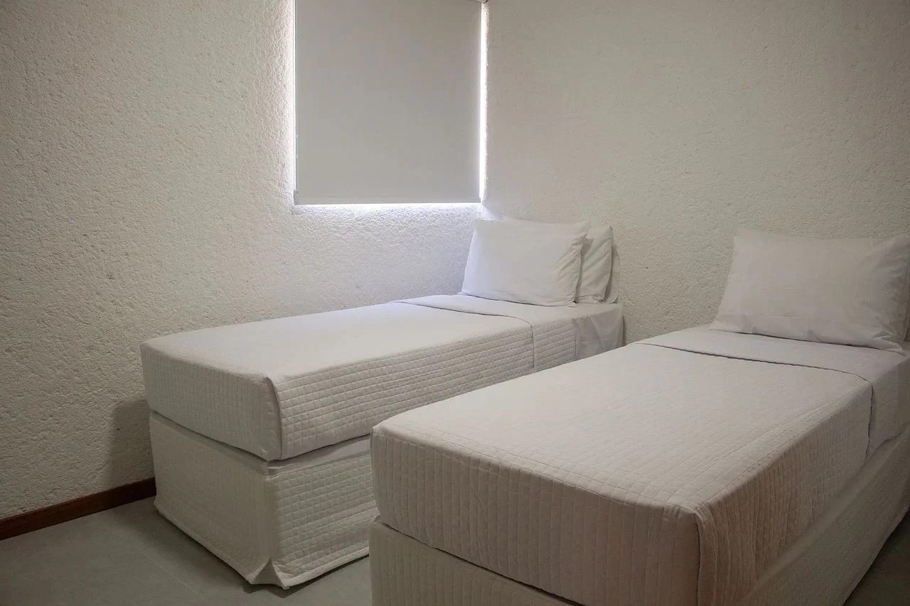 Dormitorio — Apartamento Varanda Manatee em Milagres by Qavi